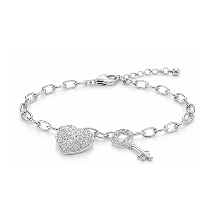 Close-up view of a chain bracelet featuring a heart-shaped charm and a key pendant, both set with small cubic zirconia stones in a silver tone finish.
