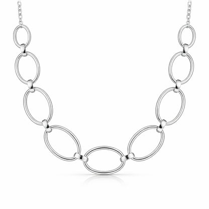 Front facing studio image of an oval link chain necklace featuring polished silver tone links.