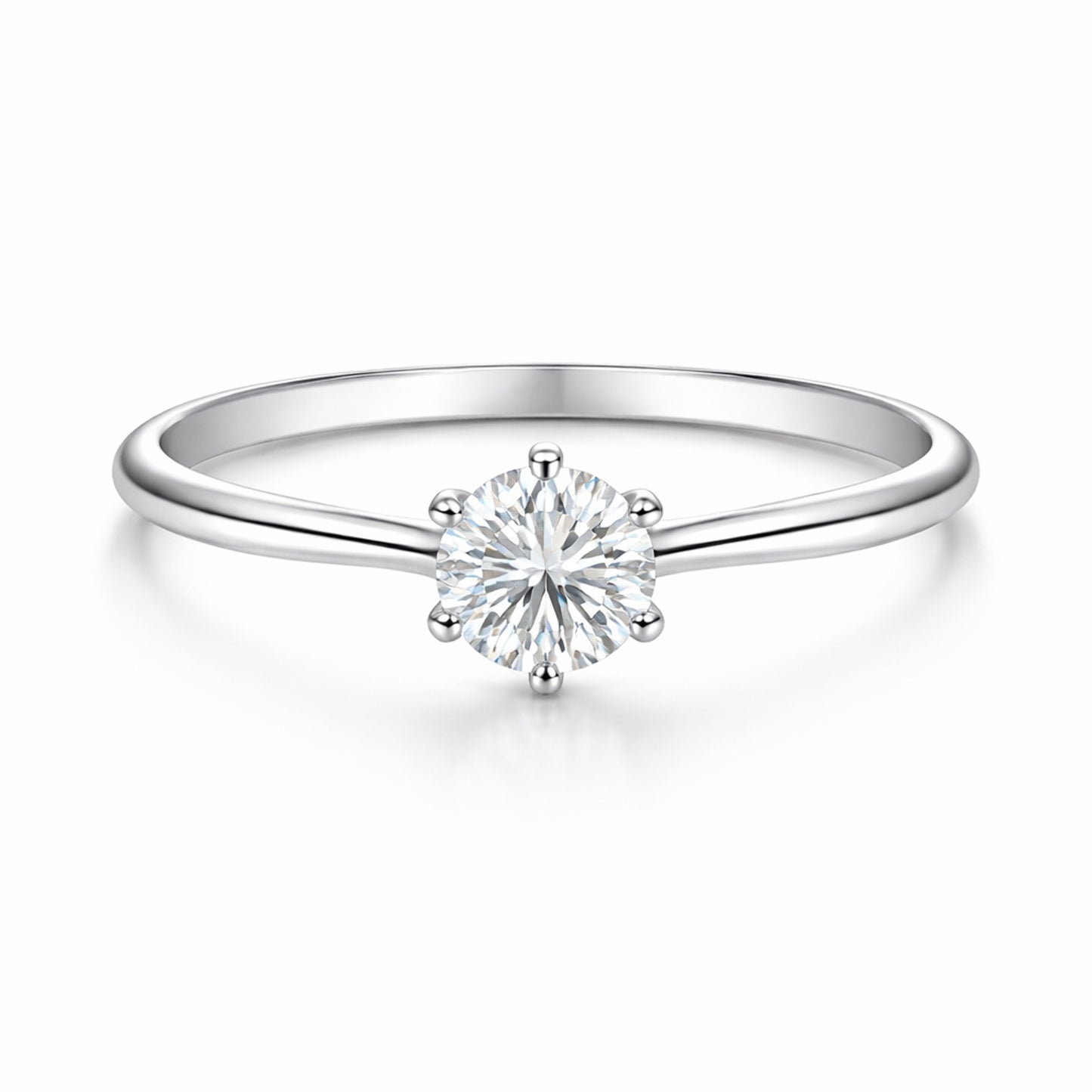 Studio view of the classic solitaire cubic zirconia ring in silver tone finish, centered on a clean background and featuring a round cut center stone in a prong setting.