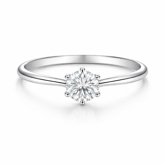 Studio view of the classic solitaire cubic zirconia ring in silver tone finish, centered on a clean background and featuring a round cut center stone in a prong setting.