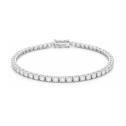 Studio view of a classic tennis bracelet featuring a continuous row of round cubic zirconia stones set in a silver tone finish with a box clasp closure.