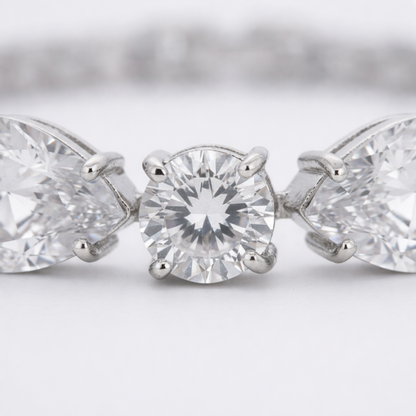 Close up detail of cubic zirconia stones and precise setting in rhodium plated brass.