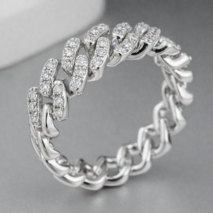 Studio view of a pavé chain link cubic zirconia ring in silver tone finish displayed against a neutral background.