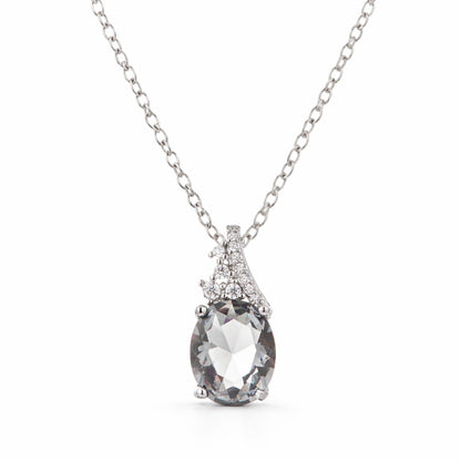 Studio view of a pear cut cubic zirconia pendant centered to highlight the classic drop shape.