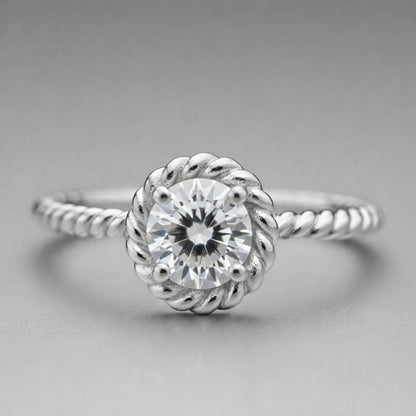 Front facing view of the rope style solitaire cubic zirconia ring showcasing the round center stone in a decorative rope style setting.