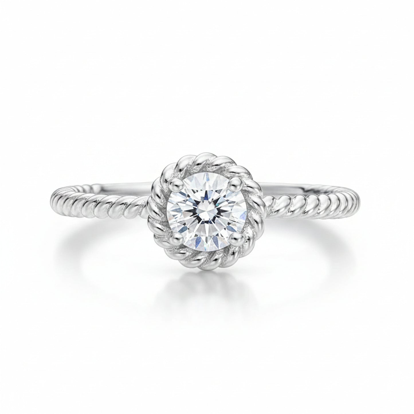 Studio view of the rope style solitaire cubic zirconia ring in silver tone finish, shown centered on a clean background.