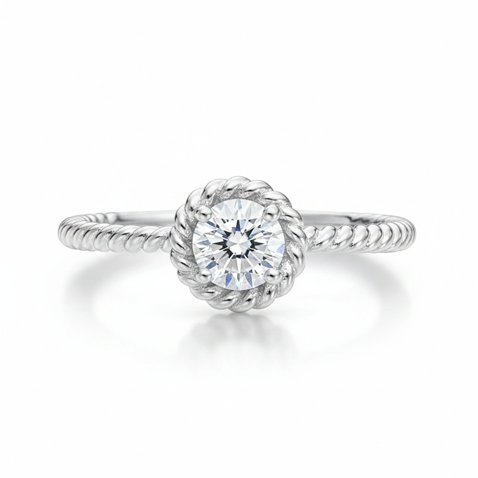 Studio view of the rope style solitaire cubic zirconia ring in silver tone finish, shown centered on a clean background.