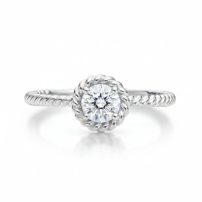 Studio view of the rope style solitaire cubic zirconia ring in silver tone finish, shown centered on a clean background.
