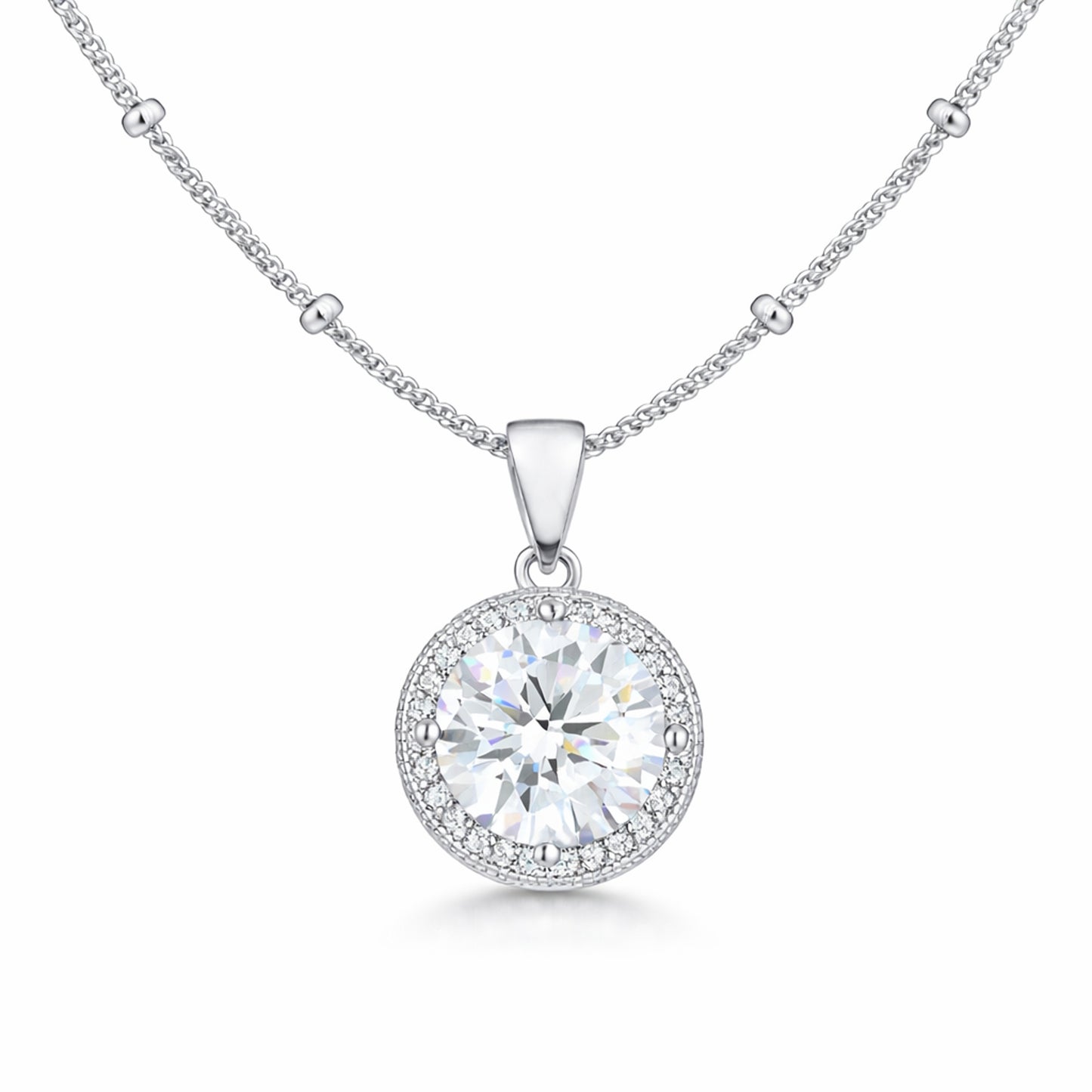 Studio view of a round halo pendant featuring a central cubic zirconia stone surrounded by a halo of smaller stones in silver tone.