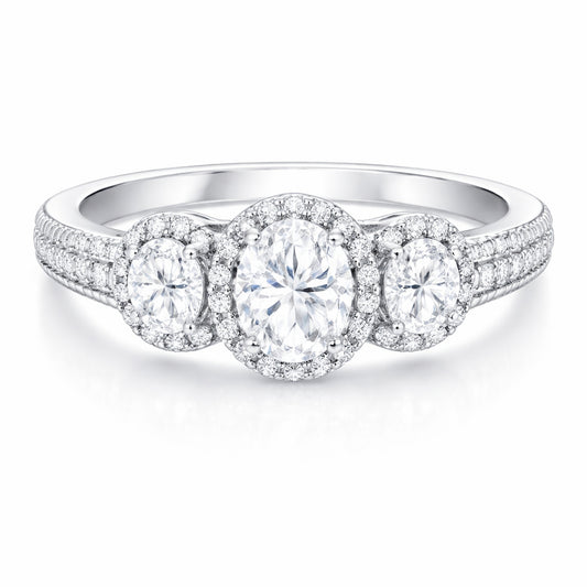 Front facing studio view of a three stone halo cubic zirconia ring in silver tone finish with symmetrical stone arrangement.